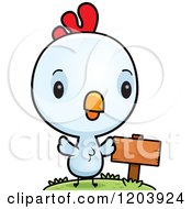 Cute Baby Rooster By A Wooden Sign Post