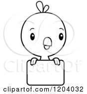 Cartoon Of A Black And White Cute Baby Chick Bird Over A Sign Royalty Free Vector Clipart