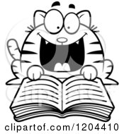 Cartoon Of A Black And White Excited Cat Reading A Book Royalty Free Vector Clipart