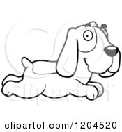 Cartoon Of A Black And White Cute Hound Dog Running Royalty Free Vector Clipart