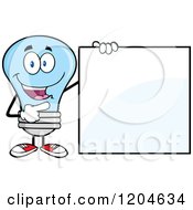 Happy Blue Light Bulb Mascot Pointing To A Sign