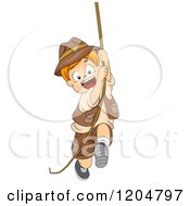 Happy Red Haired White Explorer Boy Swinging On A Rope