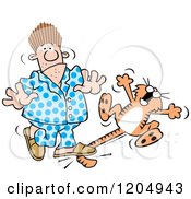 Cartoon Of A Sleeping Man Stepping On A Cats Tail During A Catcident Royalty Free Vector Clipart by Johnny Sajem