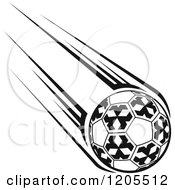 Clipart Of A Black And White Flying Soccer Ball 4 Royalty Free Vector Illustration
