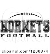 Clipart Of A Black And White American Football And HORNETS Football Team Text Royalty Free Vector Illustration