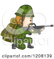 Male Soldier Kneeling And Aiming A Rifle