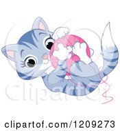 Cartoon Of A Cute Tabby Kitten Playing With A Ball Of Yarn Royalty Free Vector Clipart by Pushkin