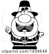 Cartoon Of A Black And White Smart Male Pilgrim Man With An Idea Royalty Free Vector Clipart