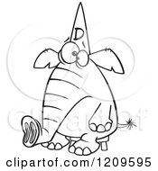 Cartoon Of A Black And White Dumb Elephant Sitting On A Stool And Wearing A Dunce Hat Royalty Free Vector Clipart