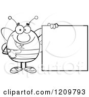 Poster, Art Print Of Black And White Happy Bee Mascot Pointing To A Sign