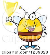 Poster, Art Print Of Successful Bee Holding Up A Trophy