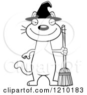 Cartoon Of A Black And White Sly Halloween Witch Cat Royalty Free Vector Clipart