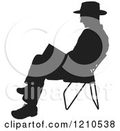 Poster, Art Print Of Black Silhouetted Man Reading In A Folding Chair