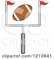 American Football Flying Over A Goal