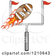 Cartoon Of A Flaming Mad American Football Mascot Flying Towards A Goal Royalty Free Vector Clipart