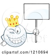 Cartoon Of A Happy Crowned Golf Ball Mascot Holding A Sign Royalty Free Vector Clipart