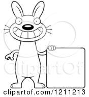 Cartoon Of A Black And White Happy Slim Rabbit With A Sign Royalty Free Vector Clipart