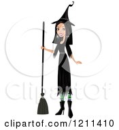 Pretty Black Haired Witch Holding A Broom