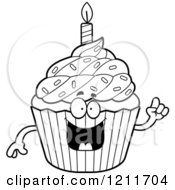 Cartoon Of A Black And White Smart Birthday Cupcake Mascot With An Idea Royalty Free Vector Clipart