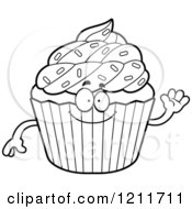 Cartoon Of A Black And White Waving Sprinkled Cupcake Mascot Royalty Free Vector Clipart