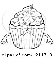 Cartoon Of A Black And White Sick Sprinkled Cupcake Mascot Royalty Free Vector Clipart