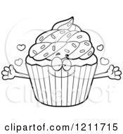 Cartoon Of A Black And White Loving Sprinkled Cupcake Mascot Wanting A Hug Royalty Free Vector Clipart