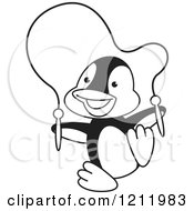 Clipart Of A Black And White Happy Penguin Playing With A Jump Rope Royalty Free Vector Illustration