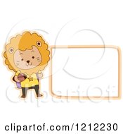 Cartoon Of A Male Student Lion With A Football And Blank Label Royalty Free Vector Clipart
