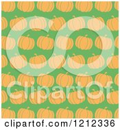 Clipart Of A Seamless Pattern Of Orange Pumpkins Over Green Royalty Free Vector Illustration