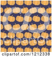 Clipart Of A Seamless Pattern Of Orange Pumpkins Over Dark Blue Royalty Free Vector Illustration