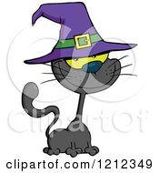 Cartoon Of A Black Halloween Cat Wearing A Witch Hat Royalty Free Vector Clipart