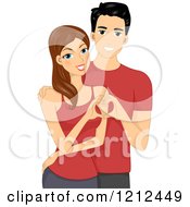 Cartoon Of A Happy Young Couple Forming A Heart With Their Hands And Wearing Matching Red Shirts Royalty Free Vector Clipart