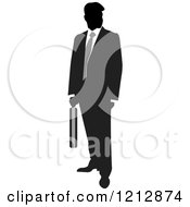Clipart Of A Silhouetted Businessman With A Gray Tie And Briefcase Royalty Free Vector Illustration by Lal Perera