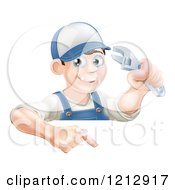 Cartoon Of A Happy Brunette Worker Man Holding A Wrench And Pointing Down To A Sign Royalty Free Vector Clipart