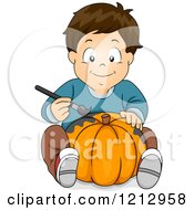Poster, Art Print Of Boy Painting A Halloween Pumpkin