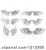 Clipart Of Pairs Of Black Feathered Wings 2 Royalty Free Vector Illustration