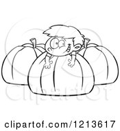 Cartoon Of A Black And White Happy Boy Resting On A Large Pumpkin Royalty Free Vector Clipart