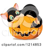 Clipart Of A Cute Kitten Wearing A Speckled Costume And Curled Up On A Halloween Pumpkin Royalty Free Vector Illustration