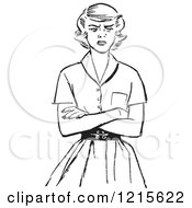 Retro Teen Girl With Folded Arms And An Angry Expression In Black And White