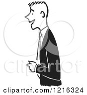 Cartoon Of A Retro Friendly Man Smiling In Black And White Royalty Free Vector Clipart