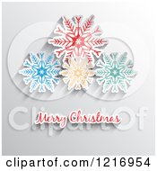 Clipart Of A Merry Christmas Greeting Under Colorful Snowflakes On Gray Royalty Free Vector Illustration