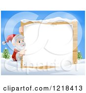 Poster, Art Print Of Santa Claus Pointing To A Christmsa Sign In The Snow