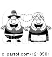 Clipart Of A Black And White Pilgrim Couple Holding Hands Under A Heart Royalty Free Vector Illustration