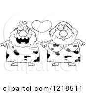 Clipart Of A Black And White Caveman Couple Holding Hands Under A Heart Royalty Free Vector Illustration by Cory Thoman