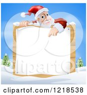 Poster, Art Print Of Santa Claus Pointing Down To A Christmsa Sign In A Winter Landscape