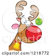 Clipart Of A Goofy Christmas Red Nosed Rudolph Reindeer With A Bauble On His Antler Royalty Free Vector Illustration