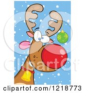 Clipart Of A Goofy Christmas Red Nosed Rudolph Reindeer With A Bauble On His Antler And Snow Royalty Free Vector Illustration