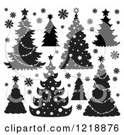 Clipart Of Black And White Christmas Trees And Snowflakes Royalty Free Vector Illustration by visekart