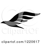 Clipart Of A Black And White Flying Bird Royalty Free Vector Illustration