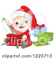Happy Caucasian Baby Boy Opening Christmas Presents